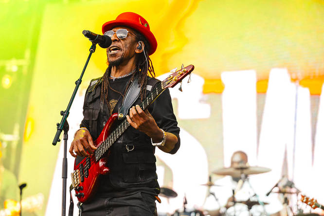 Artist on stage playing a guitar at Lambeth Country Show 2025