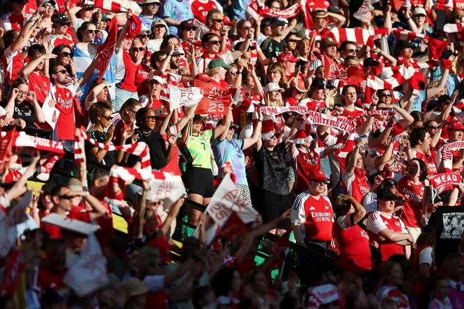 Arsenal fans in Lisbon celebrating the Champions League final win
