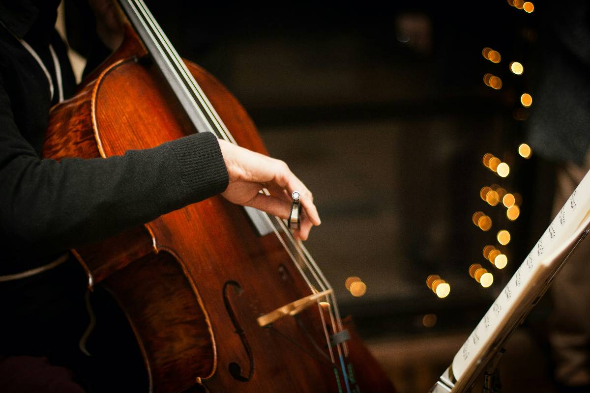 A close-up shot of a cello player