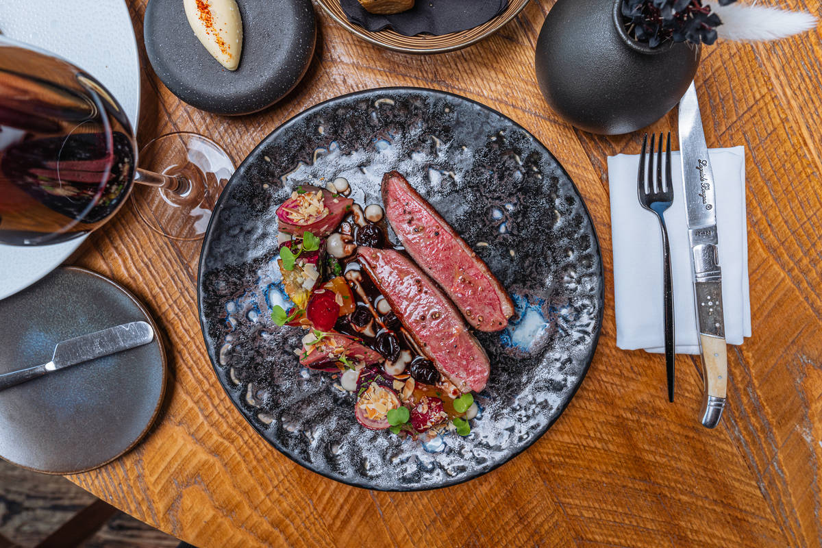 two slices of steak on a plate