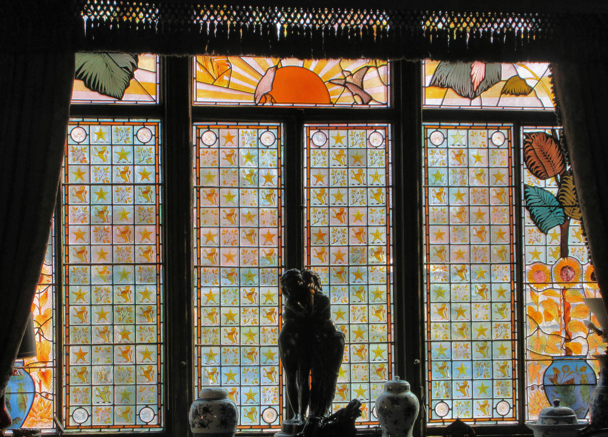 An intricate stain glass window inside Sambourne House