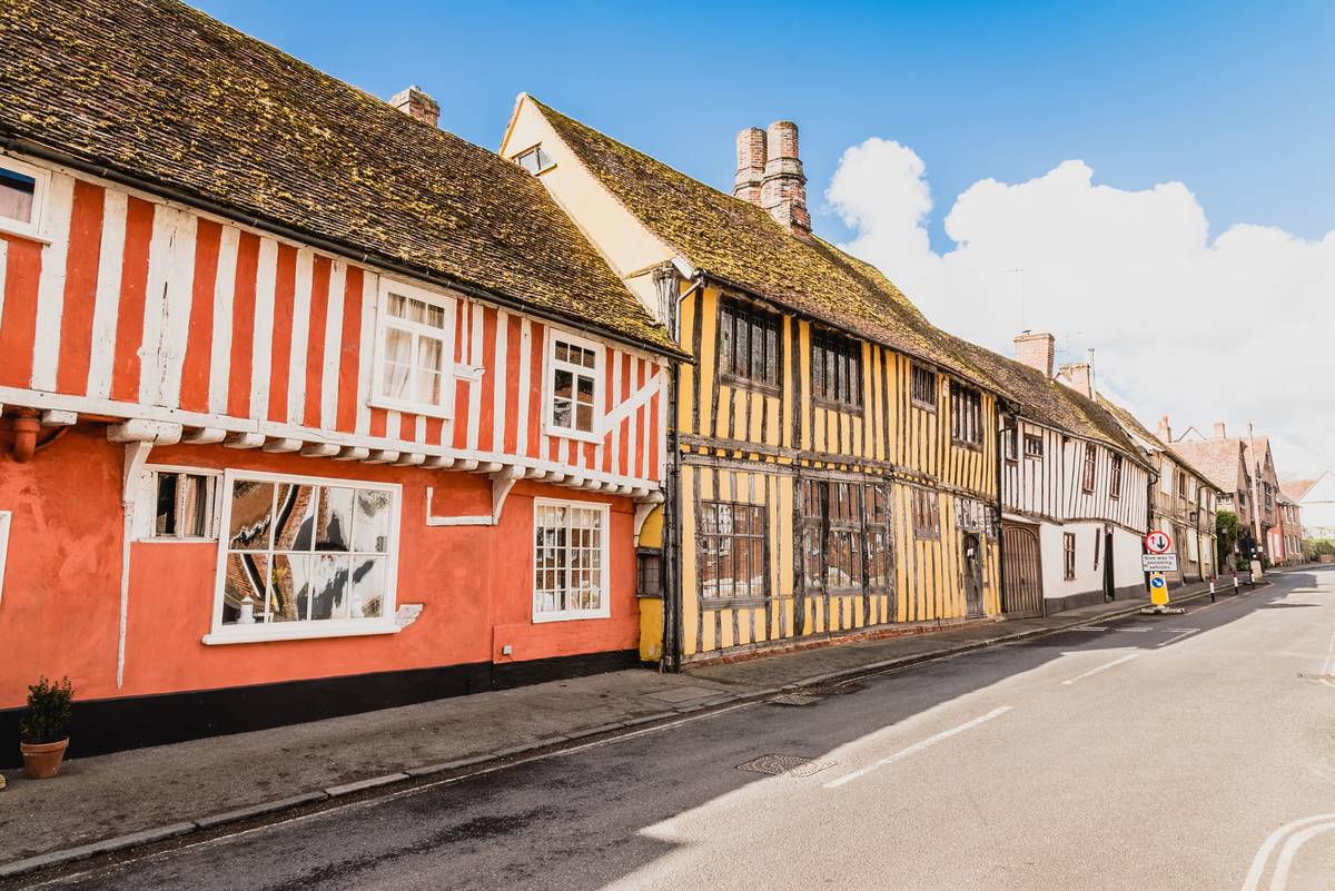 A row of Tudor buildings in a picturesque village in England
