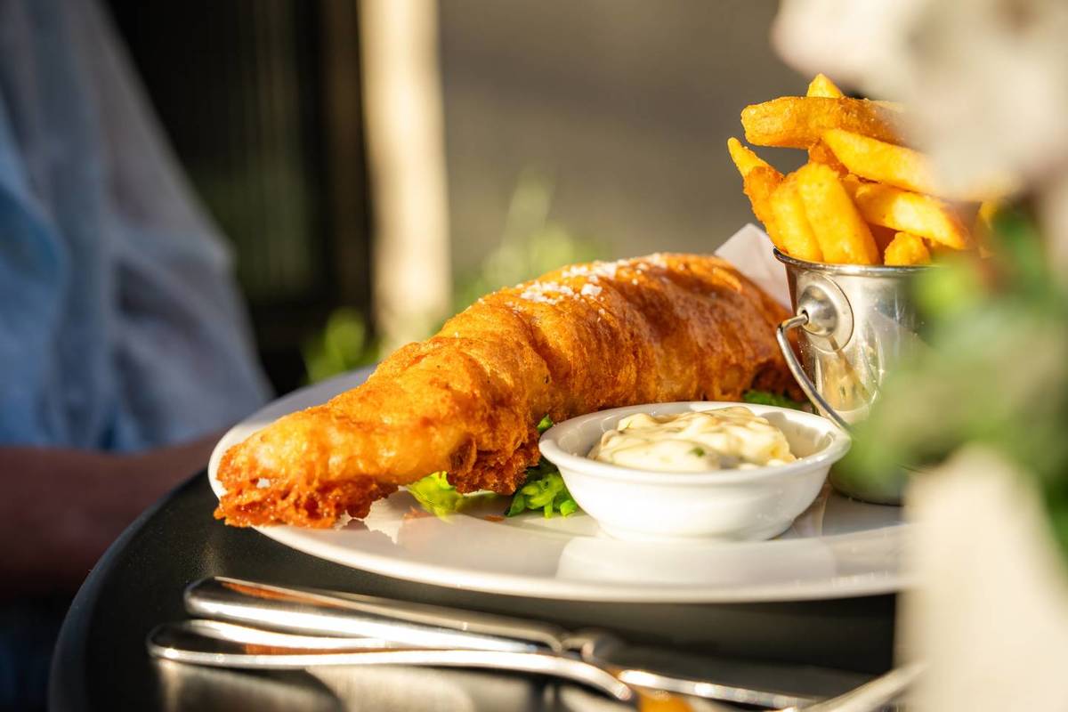 a portion of fish and chips on a plate