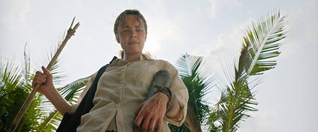 Rachel McAdams stares down with a frown in the film 'Send Help'