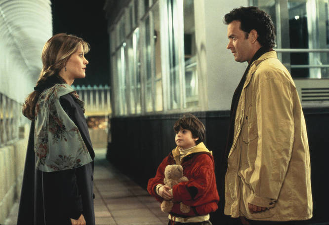 Tom Hanks and Meg Ryan in a still from the film 'sleepless in seattle' with child actor Ross Malinger playing Hanks' character's son