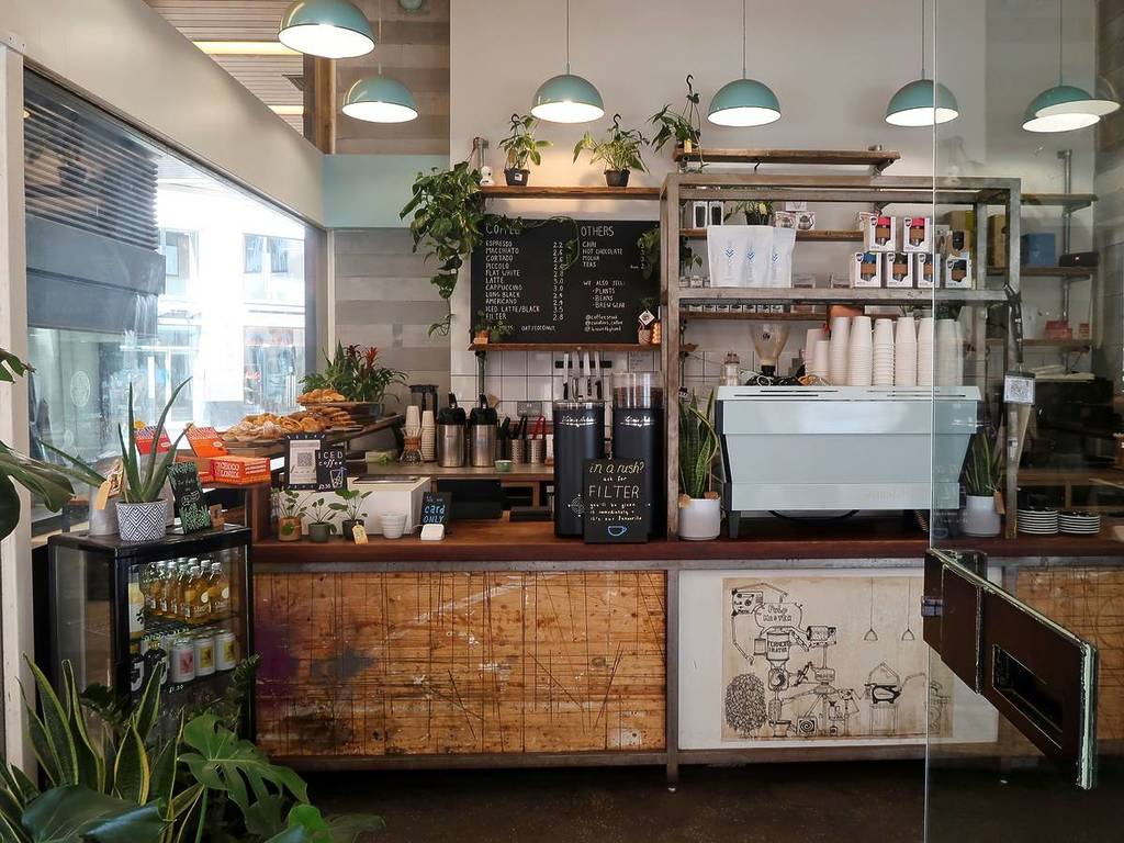 The inside of a cosy coffee shop in London