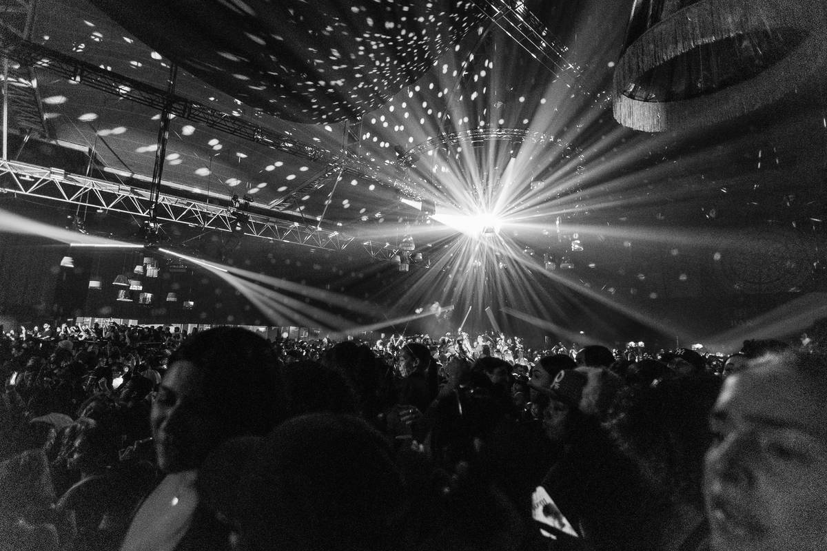shot of a venue with a disco ball reflecting light