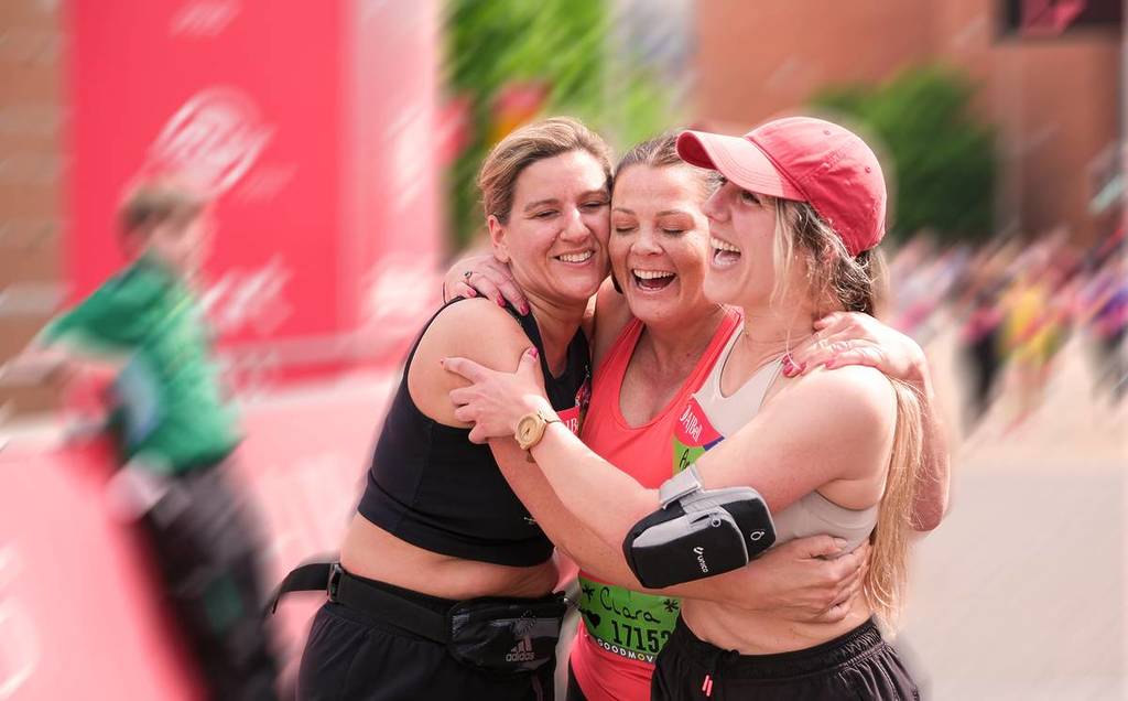 3 girls celebrating at the end of a race