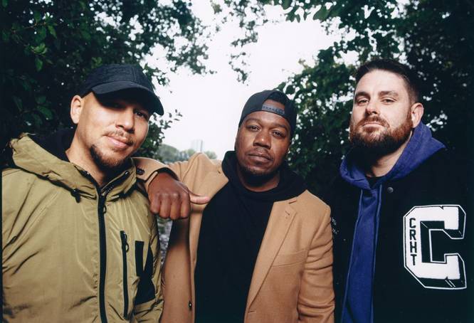 Rudimental press shot in front of some trees