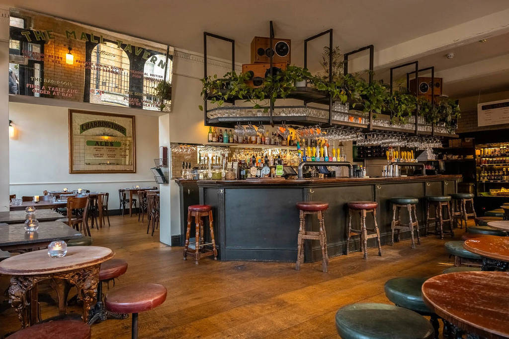the interiors of a beer focused pub in Notting Hill