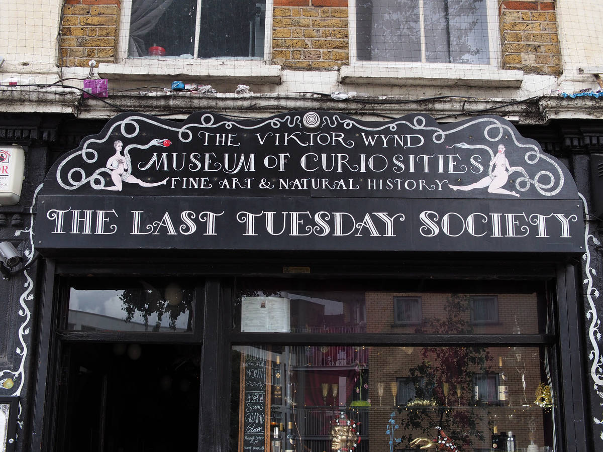 The exterior and signage of a bar and museum in Hackney