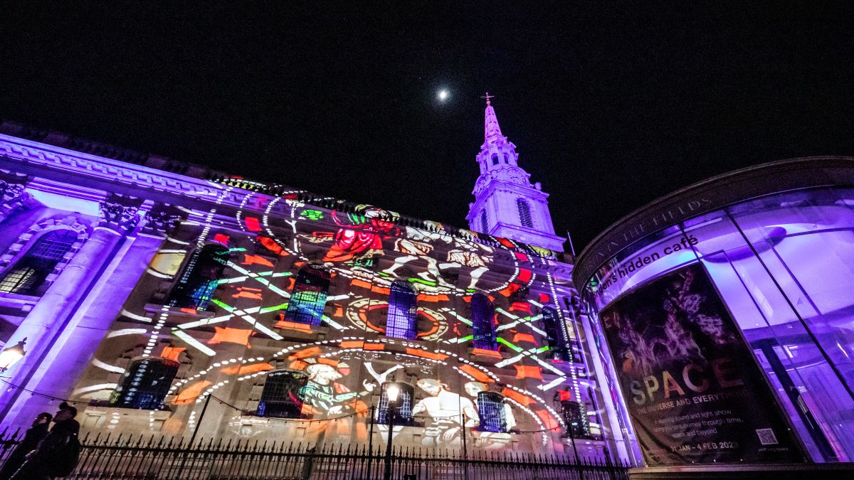 A light show taking place outside a London church