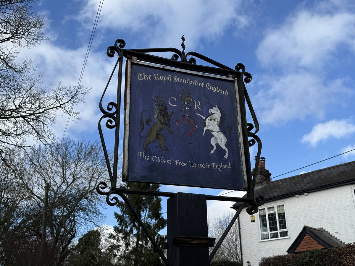 a sign for The Royal Standard of England pub, the oldest pub in England