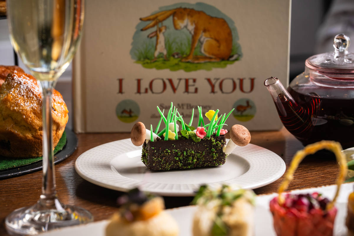 a sweet treat from a Guess How Much I Love You afternoon tea presented in front of the book, 'Guess How Much I Love You'