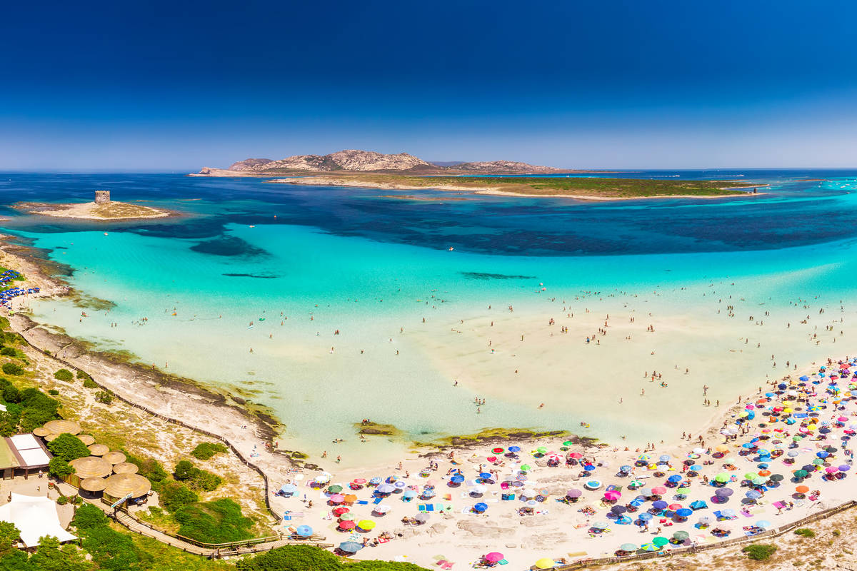 Famous La Pelosa beach with Torre della Pelosa on Sardinia island, Sardinia, Italy, Europe.