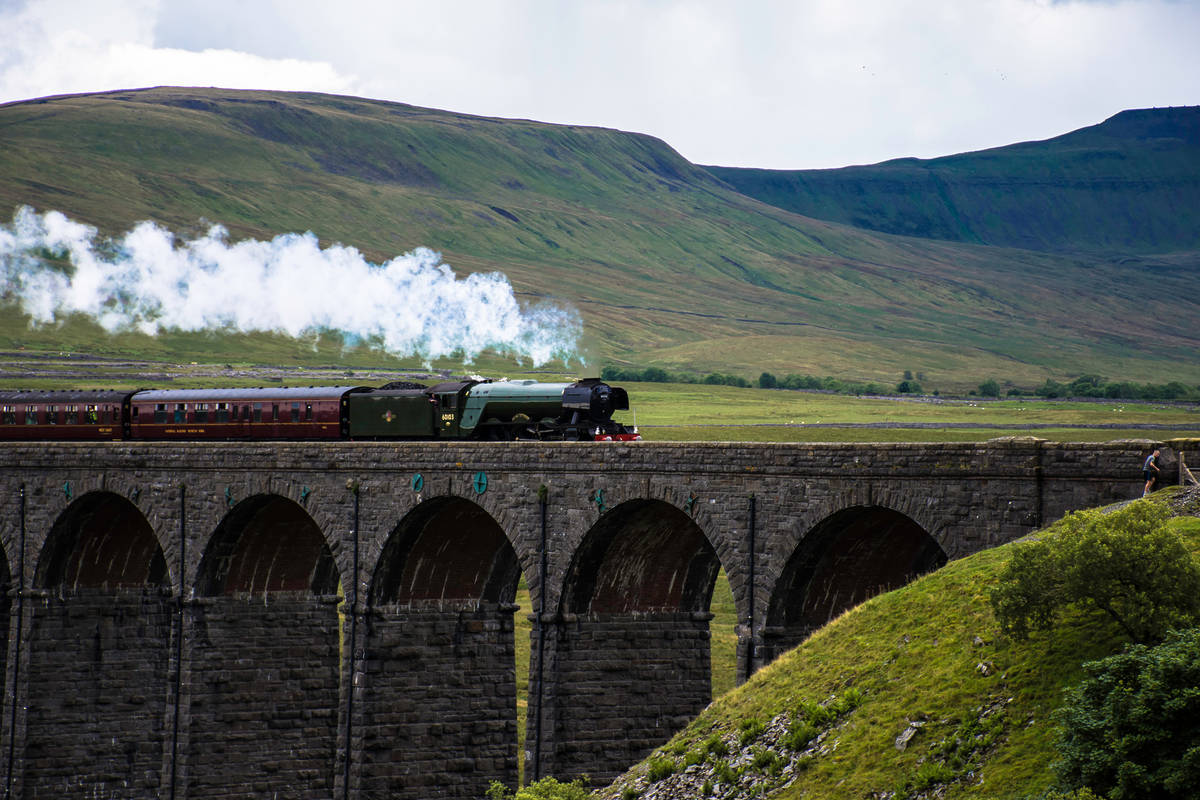 The Flying Scotsman runs across the Ribble Head viaduct in the Yorkshire Dales