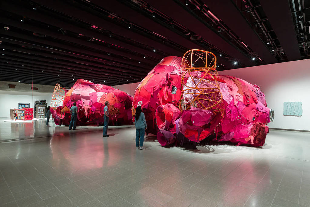 an enormous heart installation made from repurposed fabrics