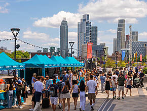 A charming riverside market has landed in the city right next to one of London’s most iconic buildings – filling a Thames-side walkway with food stands, drinks vendors, artisan traders, and more