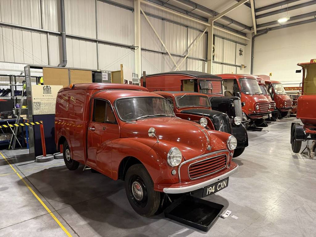 A variety of postal vehicles inside the postal museum storehouse