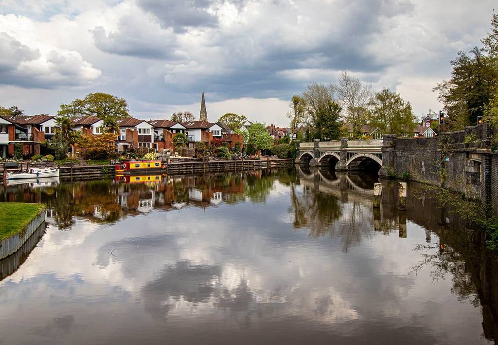 A view of buildings from across the river in Weybridge