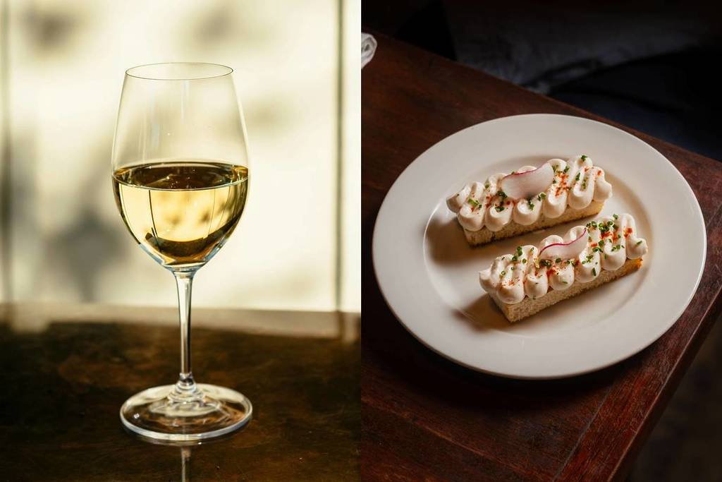 A vertically split collage of two images: on the left, a glass of white wine and on the right, a plate of canapés