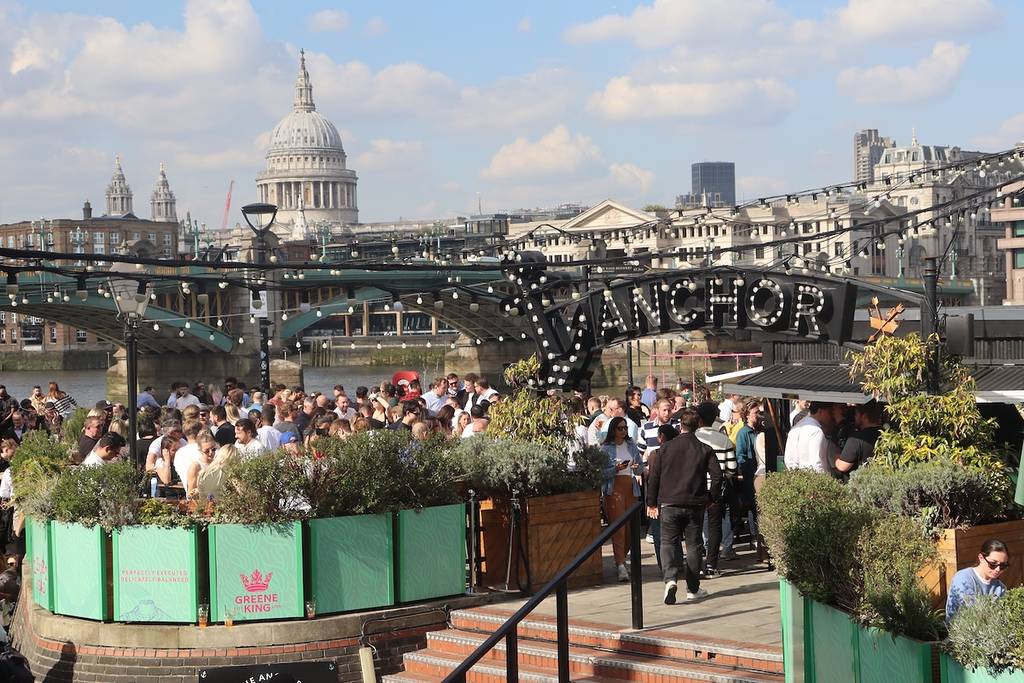the terrace at the anchor pub with st pauls in the background