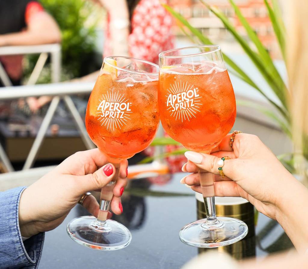 aperol spritz cheers on a terrace