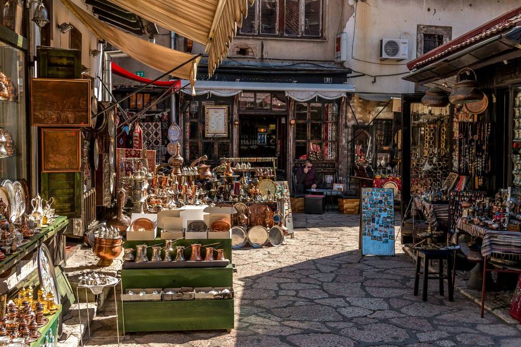 a street market in Sarajevo with lots of items on display