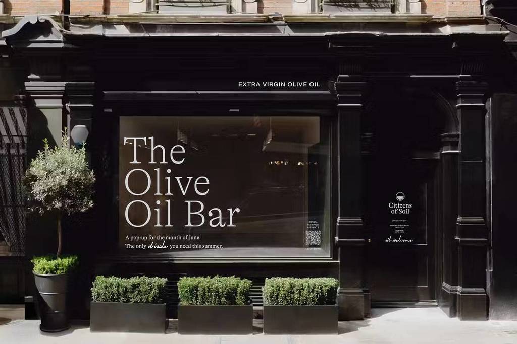 uma loja com as palavras «the olive oil bar»