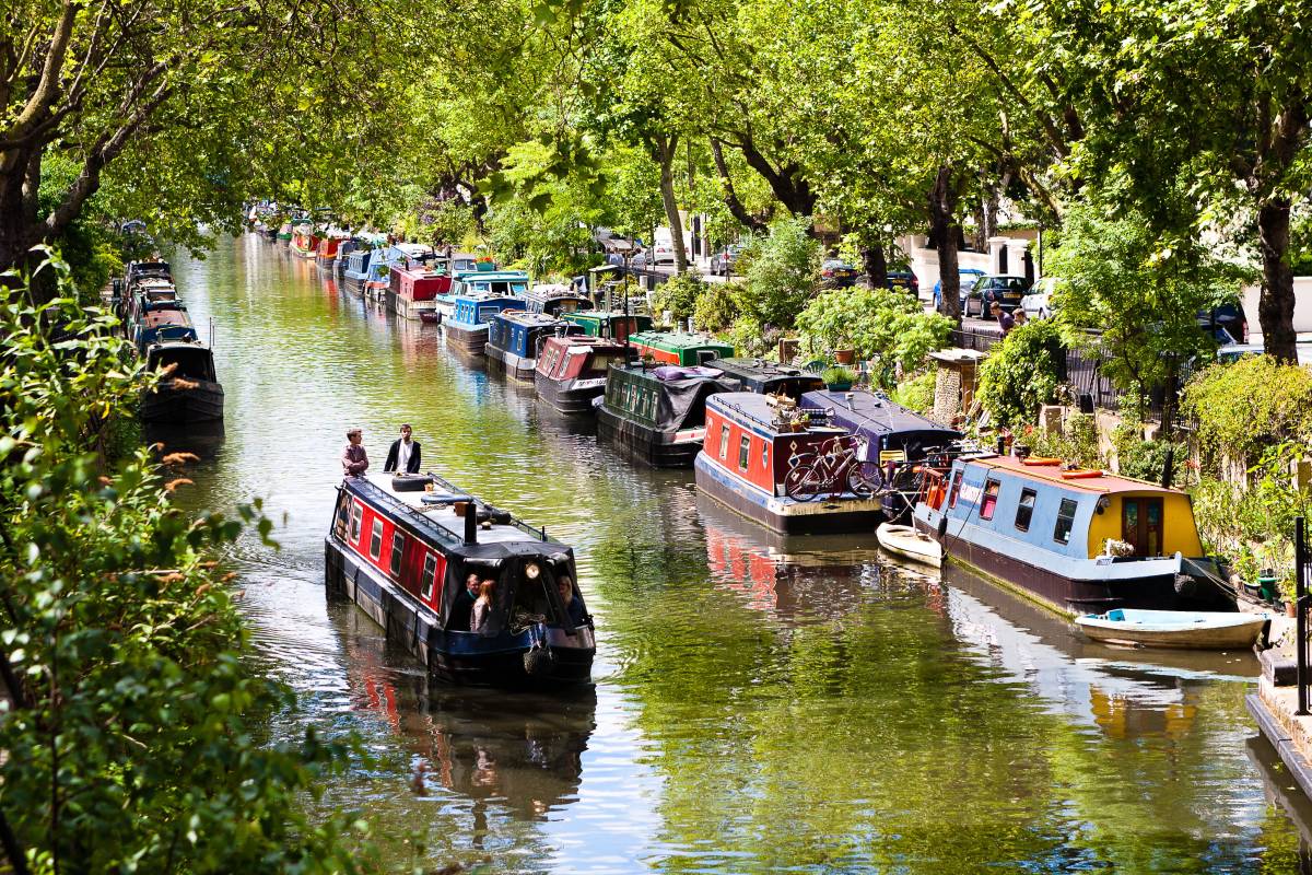 London's Little Venice is a hidden haven in the heart of the capital city – and it's filled with colourful canal boats, waterside walking routes, and one of London's most unique theatres