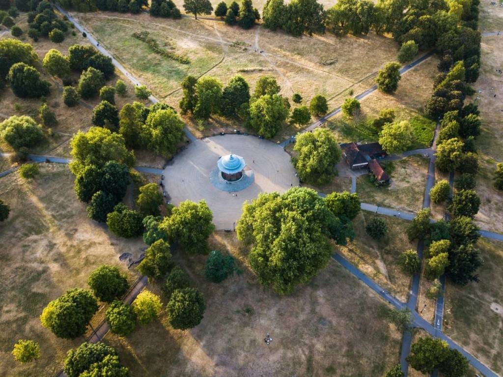 grassy areas around a bandstand in London looking very dry