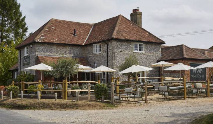 This idyllic 18th-century country inn is situated in the smallest hamlet in England – offering boutique bedrooms, field-to-fork dining, and historic charm just 90 minutes from London