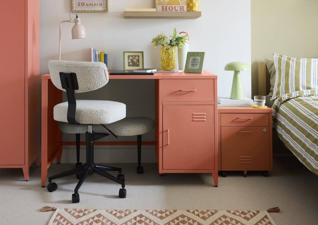 a dunelm showroom showing a student bedroom with desk and bed