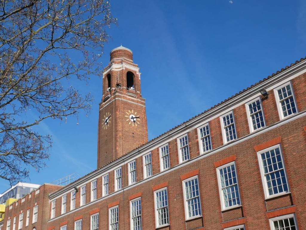 Barking Town Hall underneath a bright blue sky