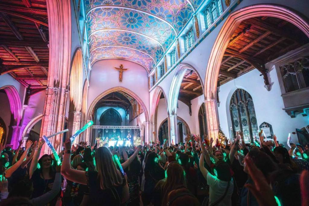 chelmsford cathedral illuminated and transformed into a silent disco