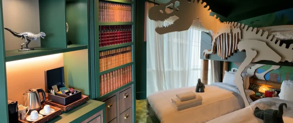 The Natural History Museum has launched the UK’s first dinosaur-themed family suite in London — hiding a giant T-Rex bedroom behind a secret bookcase door
