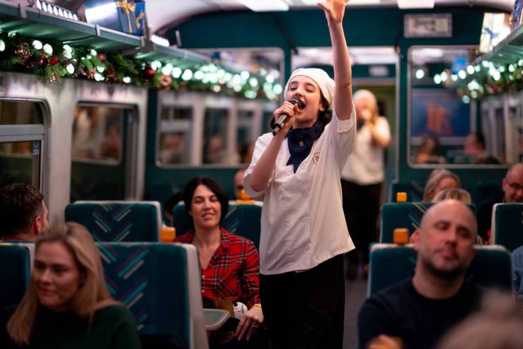 A performing chef on board the polar express experience