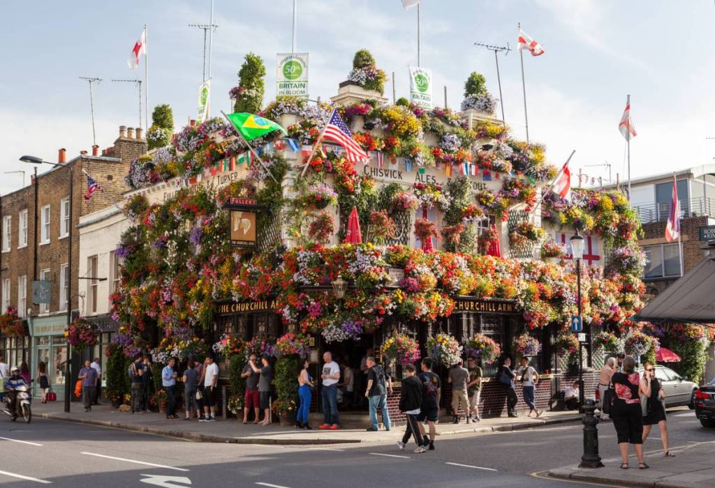The Churchill Arms in Kensington - a corner pub that is absolutely COVERED in flowers
