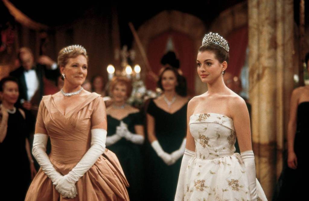 a still from The Princess Diaries, showing anne hathaway and julie andrews in ball gowns at a ball