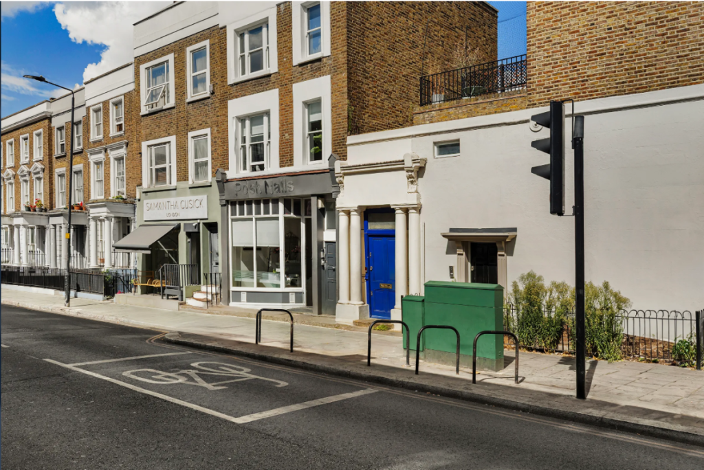 The exterior of buildings in Notting Hill, including the one with the blue door from the film, Notting Hill