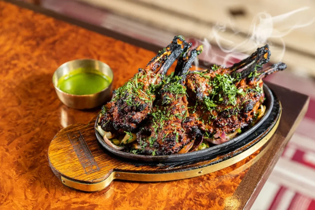 a plate of tandoori spiced lamb chops