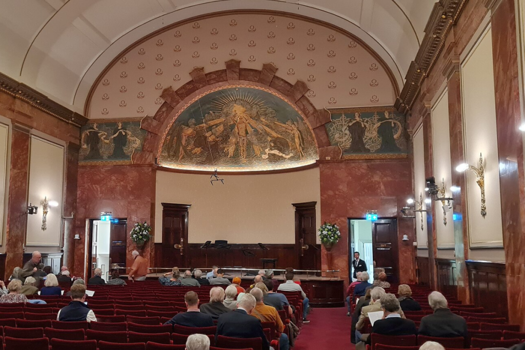 Audiences waiting for the classical music concert to start at Wigmore Hall in London