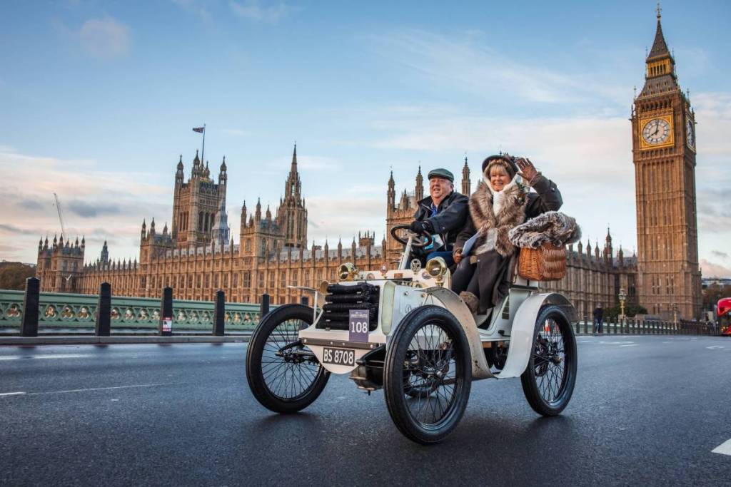 A veteran car drives over Westminster Bridge