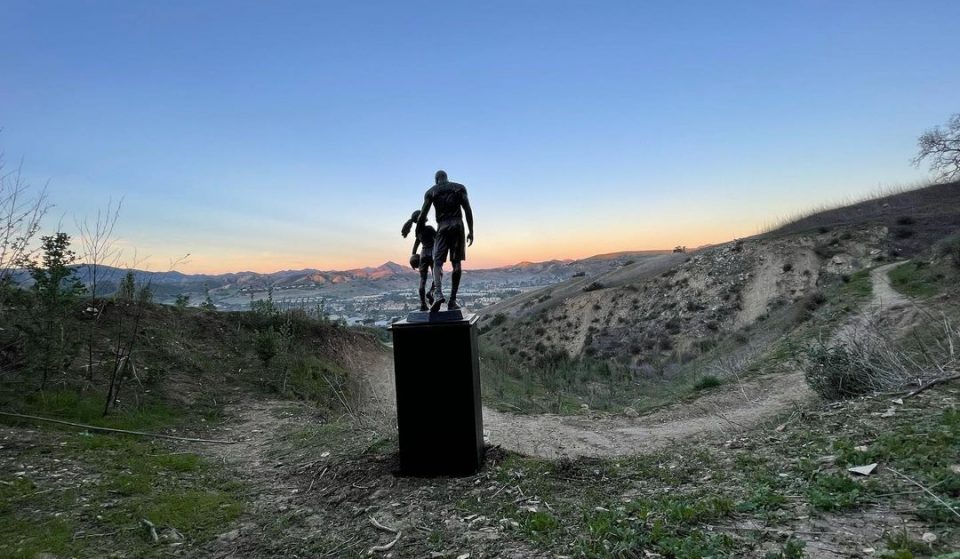 A Bronze Sculpture Of Kobe And Gianna Has Been Placed At The Crash Site