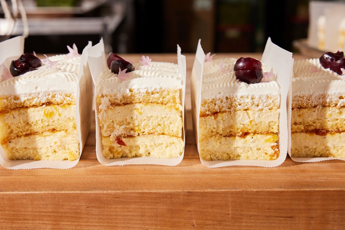 Photo of a table of slab cakes.