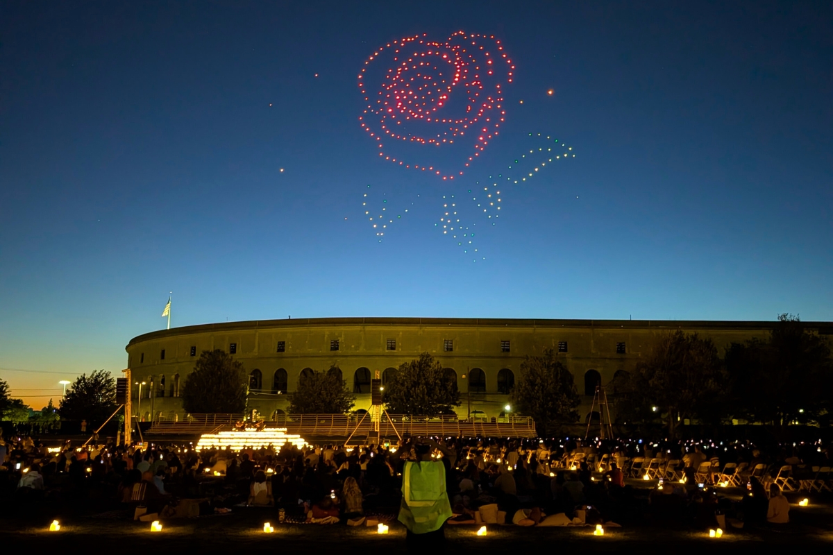 Drones light up the sky over musicians