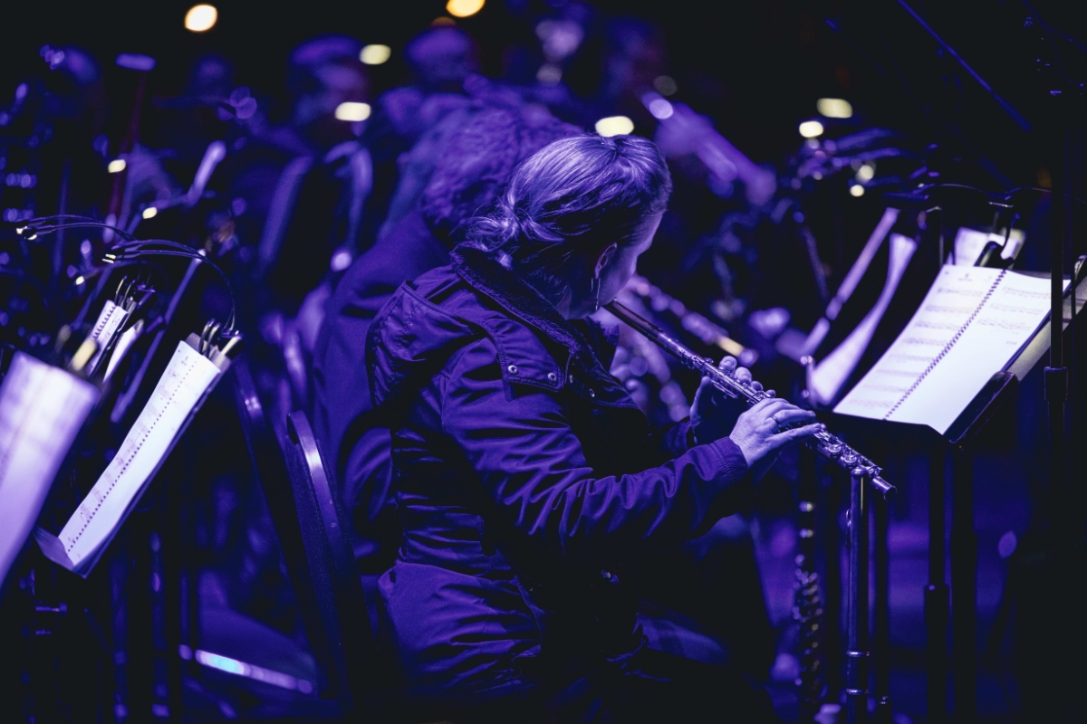 A concert plays alongside Batman (1989)