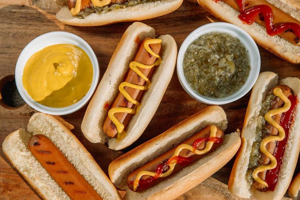 hot dogs with different toppings