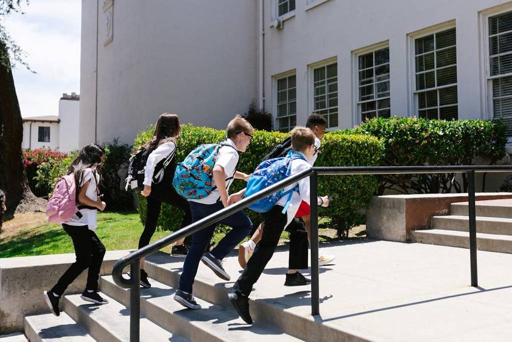 kids with backpacks