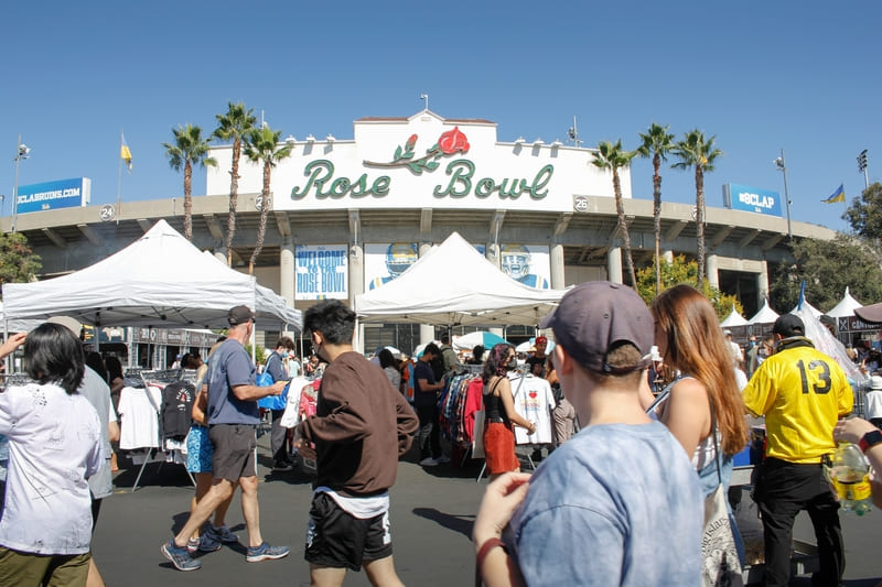 People gather in front of Rose Bowl Flea Market